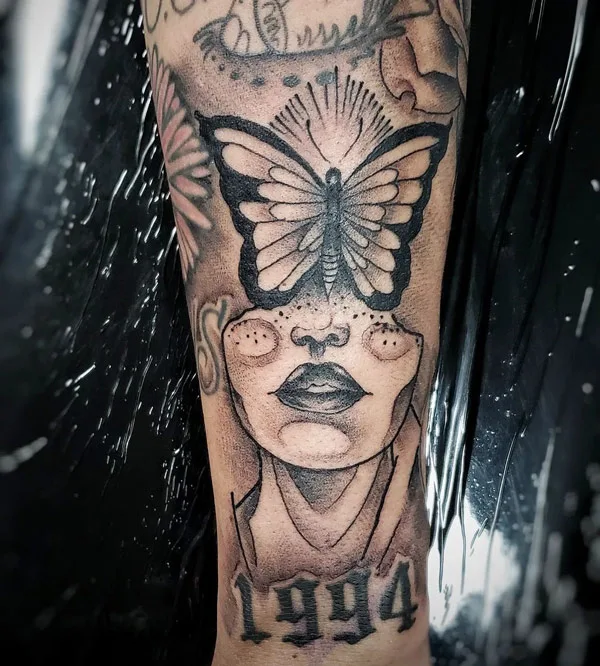 Negative Space Butterfly Tattoo
