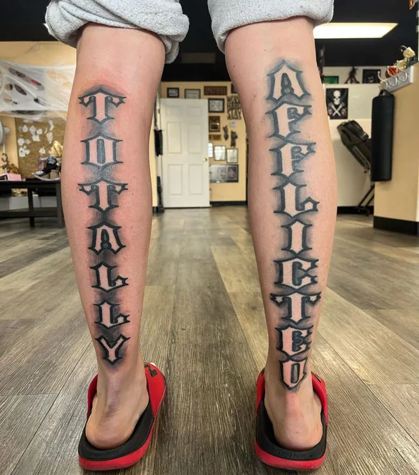 Negative Space Lettering Tattoo 1