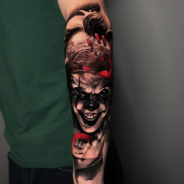 Pennywise tattoo on forearm