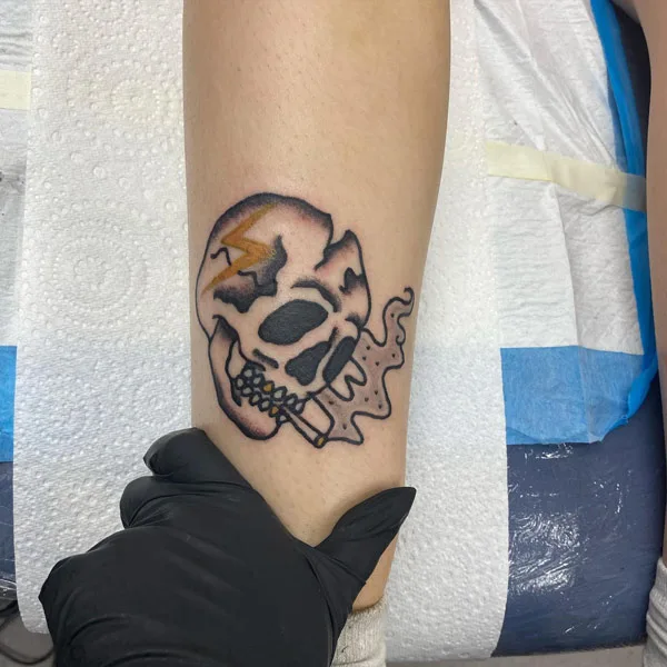 Skull lightning bolt tattoo 2