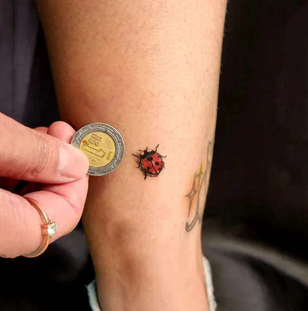 Small ladybug tattoo 1
