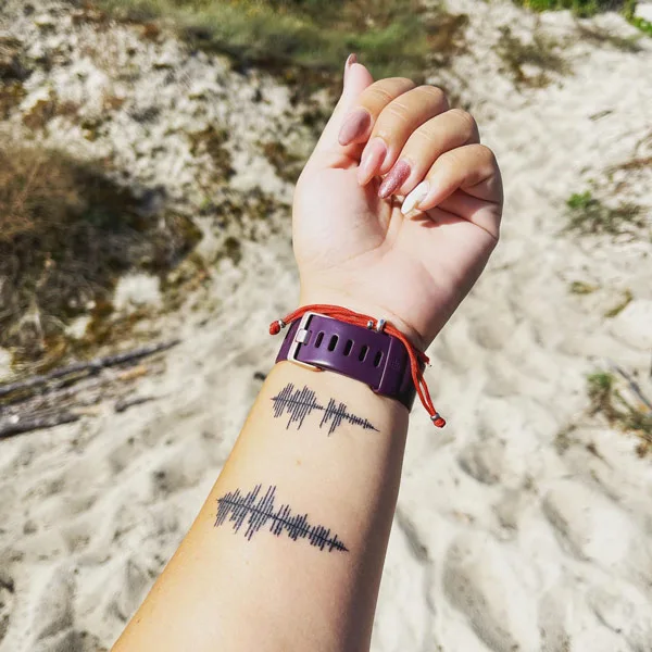 Sound Wave Wrist Tattoo