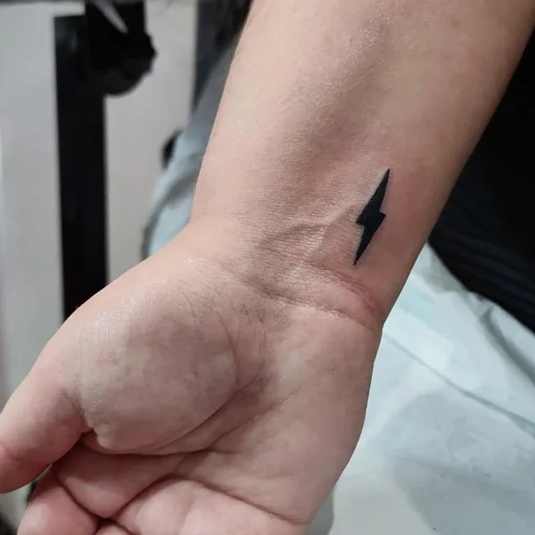 lightning bolt wrist tattoo