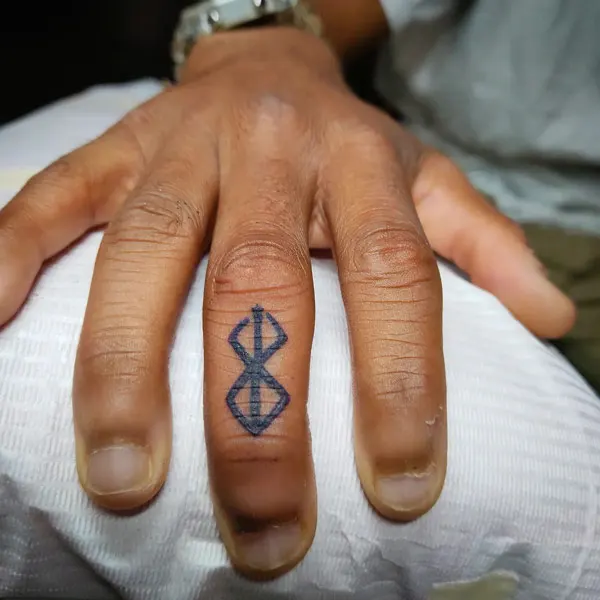 Berserk Tattoo on Finger
