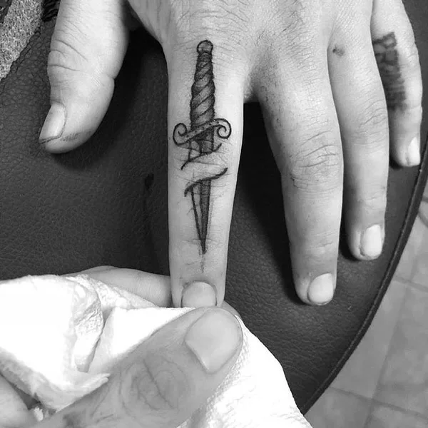 Sword Finger Tattoo 1