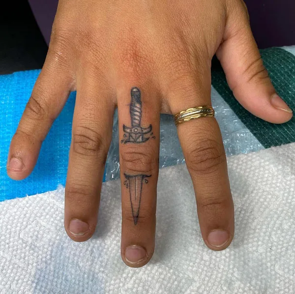 Sword Finger Tattoo 2