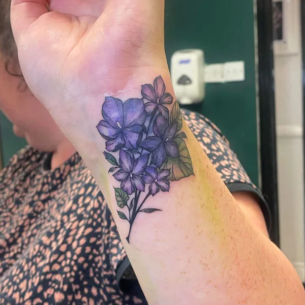 February Birth Flower Wrist Tattoo