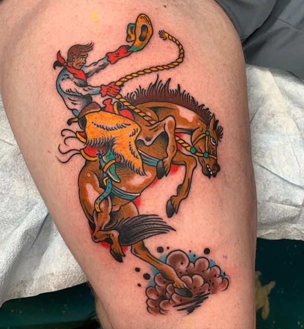 Horse Riding a Cowboy Tattoo
