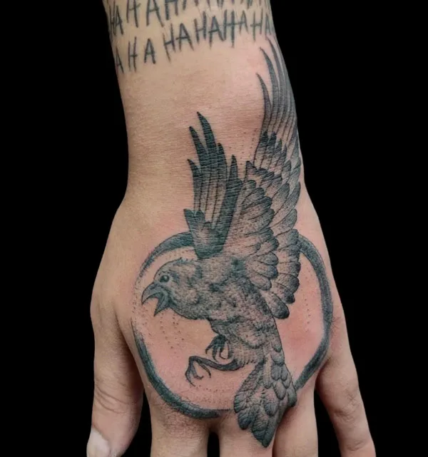Raven Hand Tattoo