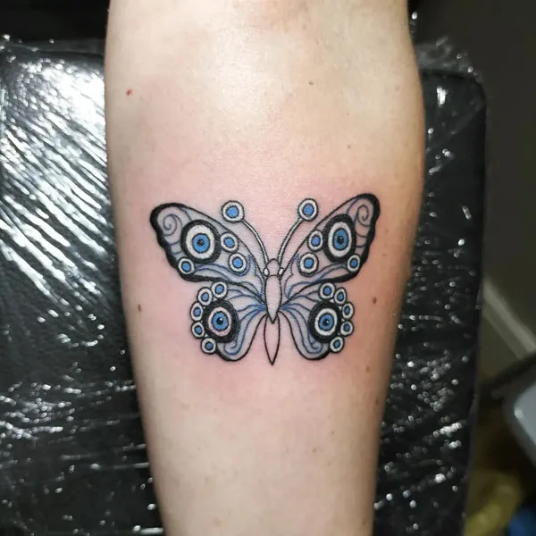 Butterfly Evil Eye Tattoo