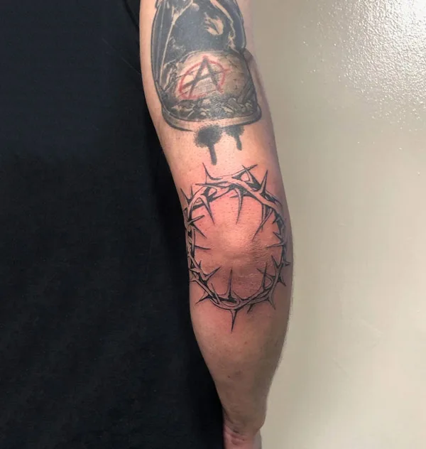 Crown of Thorns Tattoo on Elbow