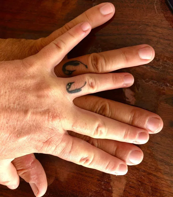 Penguin Wedding Ring Tattoo