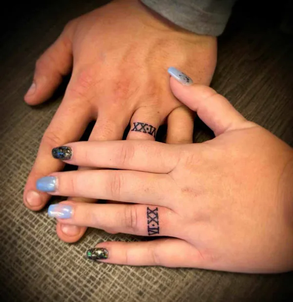 Roman Numeral Wedding Ring Tattoo 1