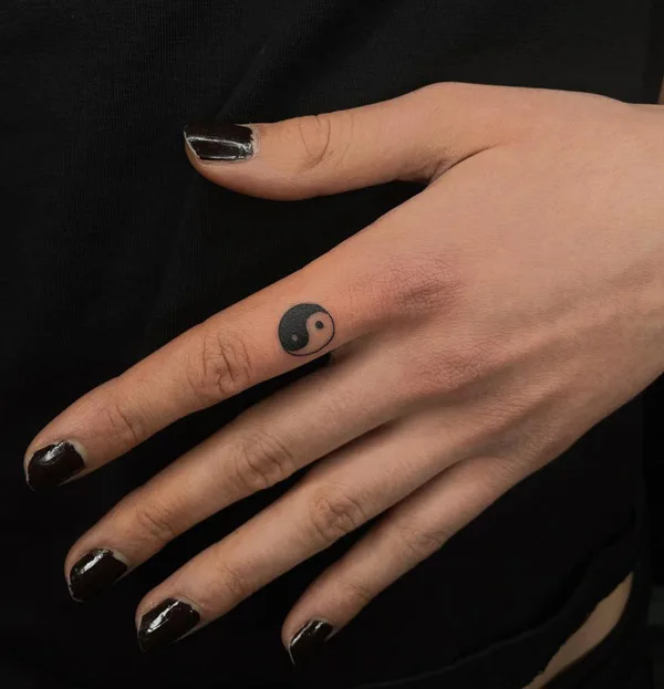 Yin Yang Finger Tattoo