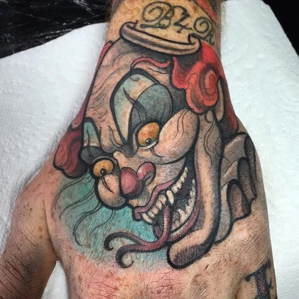 Clown Hand Tattoo