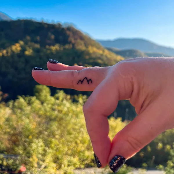 Mountain Finger Tattoo