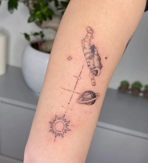 Saturn and Astronaut Tattoo